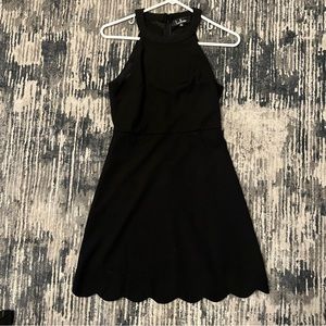 Black Lulu’s dress with scalloped edge. Size small.